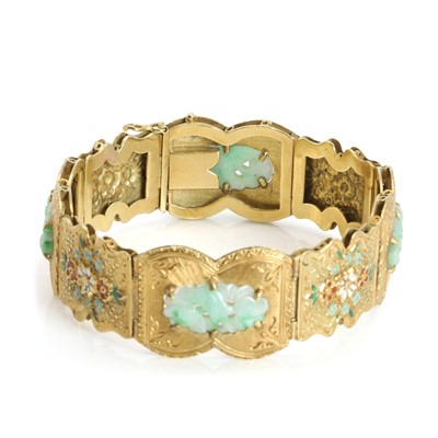 Lot 94 - A carved jade and enamel panel bracelet