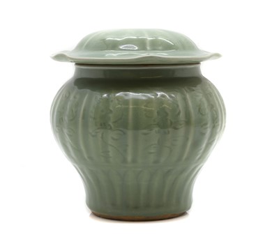 Lot 290 - A Chinese celadon jar and cover
