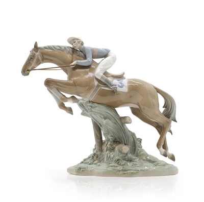 Lot 348 - A Lladro 'Jockey Mounted' porcelain figure