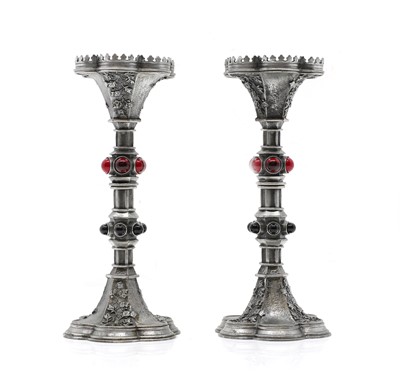 Lot 503 - A pair of pewter and hardstone candlesticks