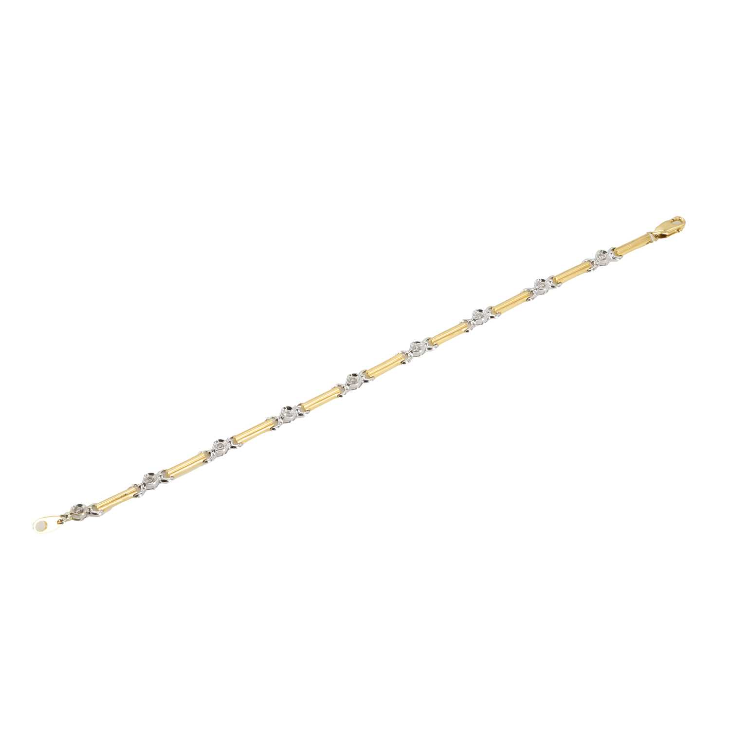 Lot 146 - A two colour gold diamond bracelet