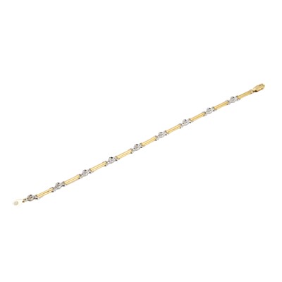 Lot 146 - A two colour gold diamond bracelet