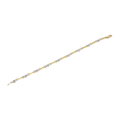 Lot 146 - A two colour gold diamond bracelet