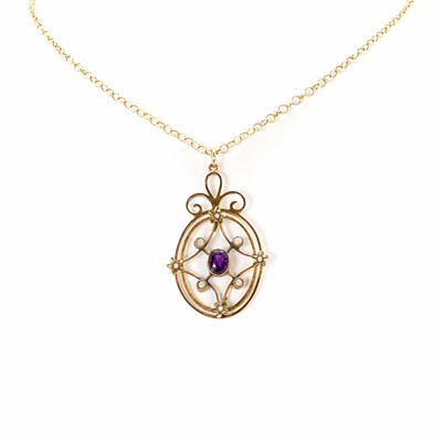 Lot 35 - An Edwardian amethyst and split pearl pendant