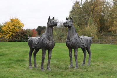 Lot 625 - A pair of bronzed-metal horses