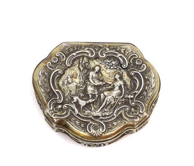 Lot 20A - A silver repousse cartouche shaped tobacco box