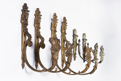 Lot 393 - A set of four ormolu curtain tie-backs