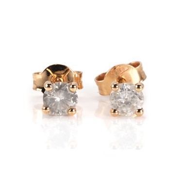 Lot 61 - A pair of rose gold diamond stud earrings