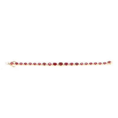 Lot 99 - A fracture-filled ruby and diamond line bracelet