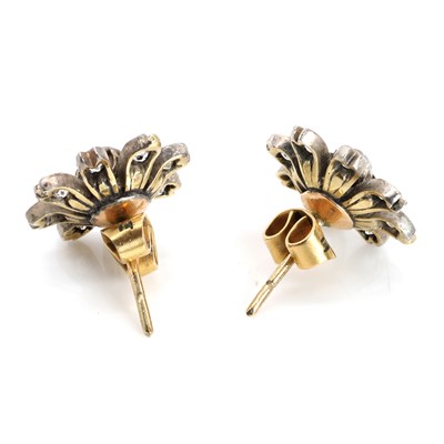 Lot 178 - A pair of diamond flower stud earrings