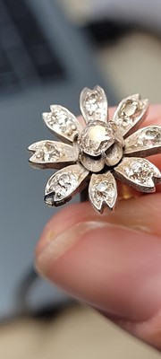 Lot 178 - A pair of diamond flower stud earrings