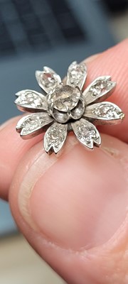 Lot 178 - A pair of diamond flower stud earrings