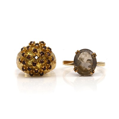 Lot 303 - A garnet cluster ring and a 9ct gold smoky quartz ring