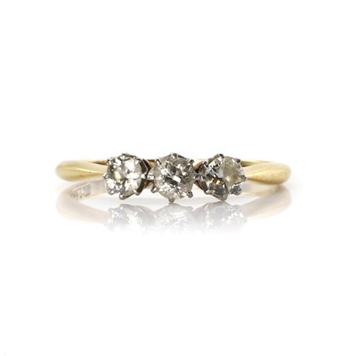 Lot 58 - A three stone diamond ring