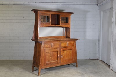 Lot 743 - A Liberty Arts and Crafts oak sideboard