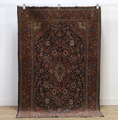 Lot 637 - A Kashan wool rug