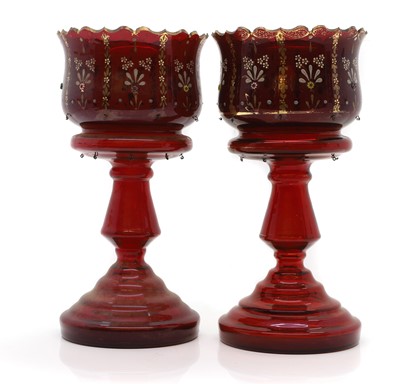 Lot 365 - A pair of Victorian ruby glass crown top lustres