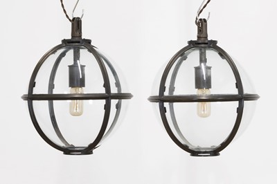 Lot 94 - A pair of bronze and glass 'Mott' globe lanterns by Jamb London