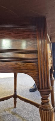 Lot 5 - A rosewood and ivory-inlaid circular centre table
