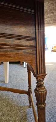 Lot 5 - A rosewood and ivory-inlaid circular centre table