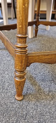 Lot 5 - A rosewood and ivory-inlaid circular centre table