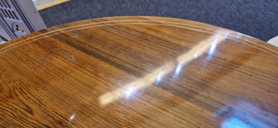 Lot 5 - A rosewood and ivory-inlaid circular centre table