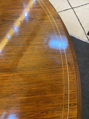 Lot 5 - A rosewood and ivory-inlaid circular centre table