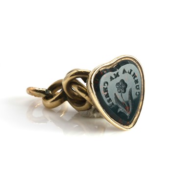 Lot 1011 - An antique bloodstone fob seal pendant
