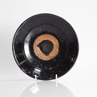 Lot 20 - A Chinese black-glazed plate