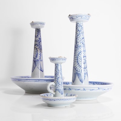 Lot 86 - A collection of three Chinese blue and white candlesticks