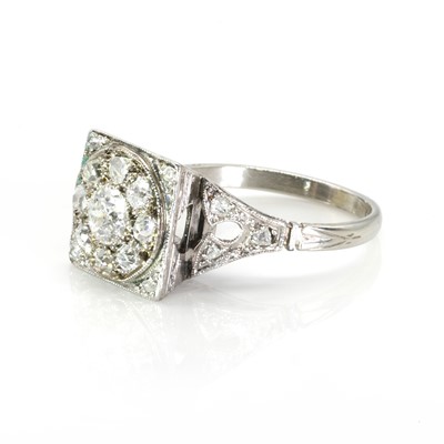 Lot 78 - A diamond square form cluster ring