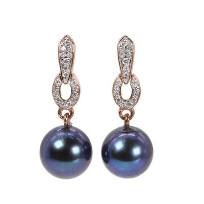 Lot 1255 - A pair of rose gold diamond set pearl earrings.