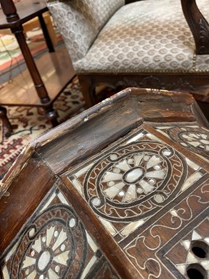 Lot 432 - A wooden, mother-of-pearl, bone and metal-inlaid octagonal table