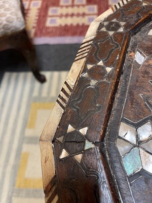 Lot 432 - A wooden, mother-of-pearl, bone and metal-inlaid octagonal table
