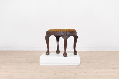 Lot 434 - A George II-style carved walnut stool