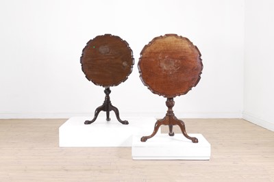 Lot 453 - Two George II-style mahogany tripod tables