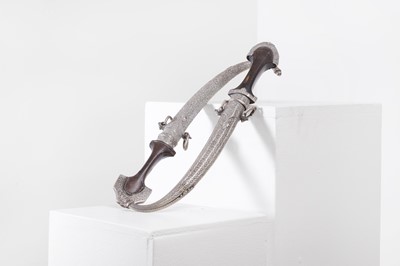 Lot 288 - Two silver-mounted daggers or jambiyas