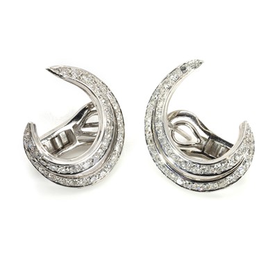 Lot 67 - A pair of white gold diamond earrings