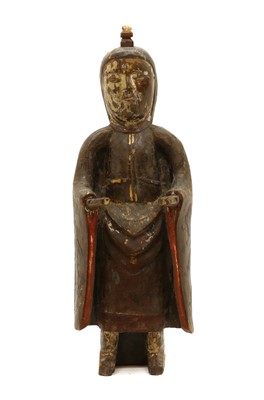 Lot 276 - A Chinese carved and painted wood deity