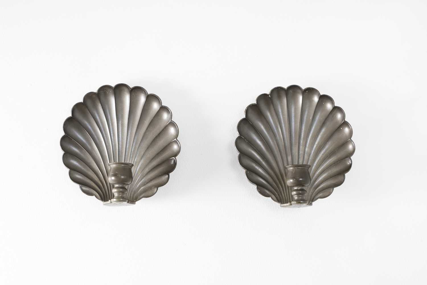 Lot 86 - A pair of pewter wall sconces