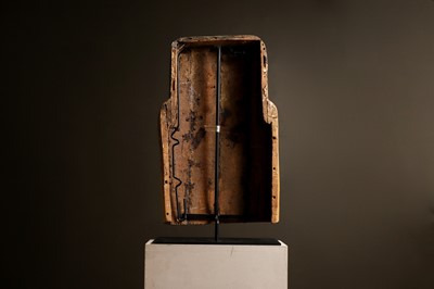 Lot 279 - An Egyptian painted wood sarcophagus or coffin lid