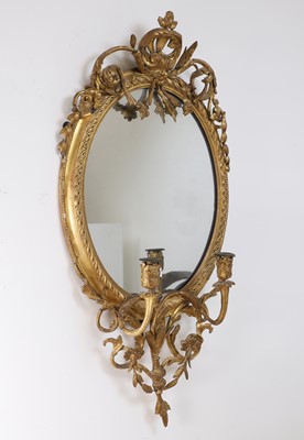 Lot 653 - A gilt-gesso girandole mirror