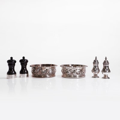 Lot 97 - A pair of silver wine coasters