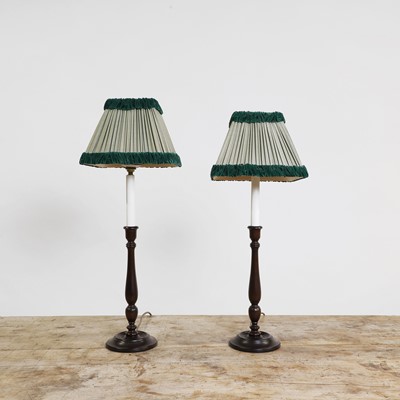 Lot 307 - A pair of mahogany table lamps