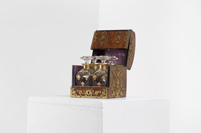 Lot 248 - A walnut cased travelling decanter set