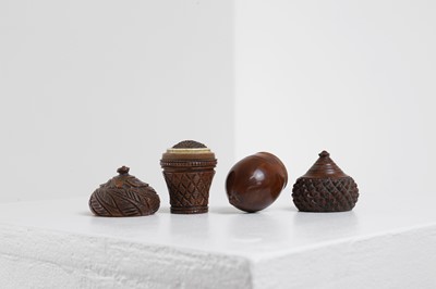 Lot 617 - Two coquilla nut nutmeg graters