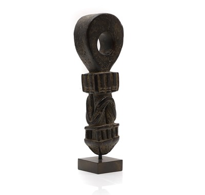 Lot 68 - A Nepalese carved wood butter churn handle