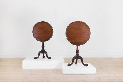 Lot 511 - A pair of George II-style mahogany tripod occasional tables