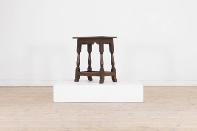 Lot 391 - An oak joint stool