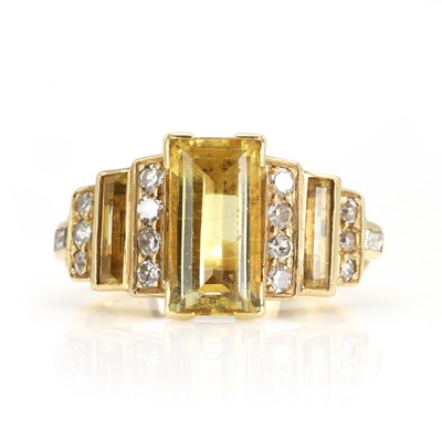Lot 158 - A yellow beryl and diamond ring